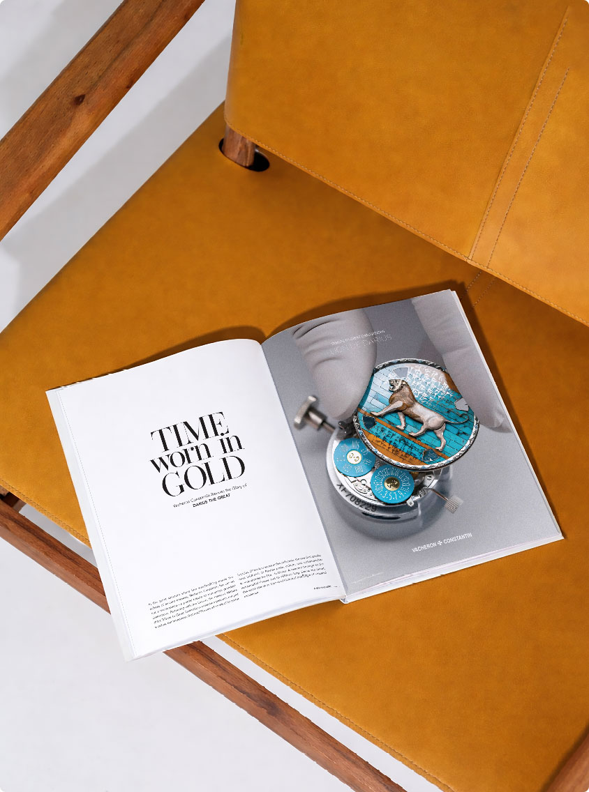 ALEPH Magazine open on an amber leather chair