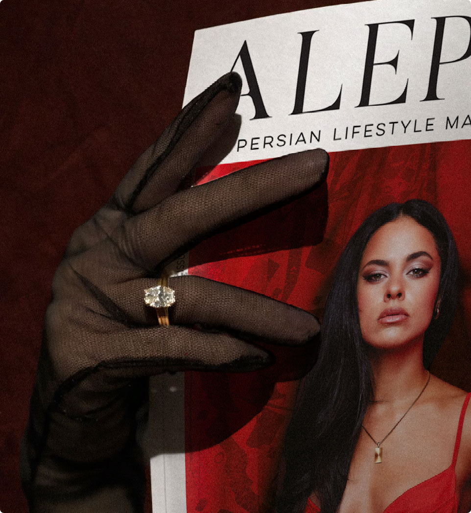 Gloved hand holding the red ALEPH Magazine cover
